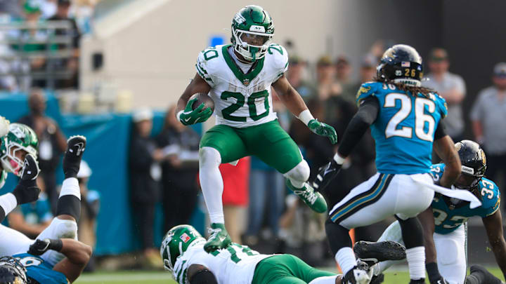 New York Jets running back Breece Hall (20) leaps while rushing for yards during the third quarter Sunday, Dec. 15, 2024 at EverBank Stadium in Jacksonville, Fla. The Jets held off the Jaguars 32-25. New York Jets running back Breece Hall (20) leaps while rushing for yards during the third quarter Sunday, Dec. 15, 2024 at EverBank Stadium in Jacksonville, Fla. The Jets held off the Jaguars 32-25.