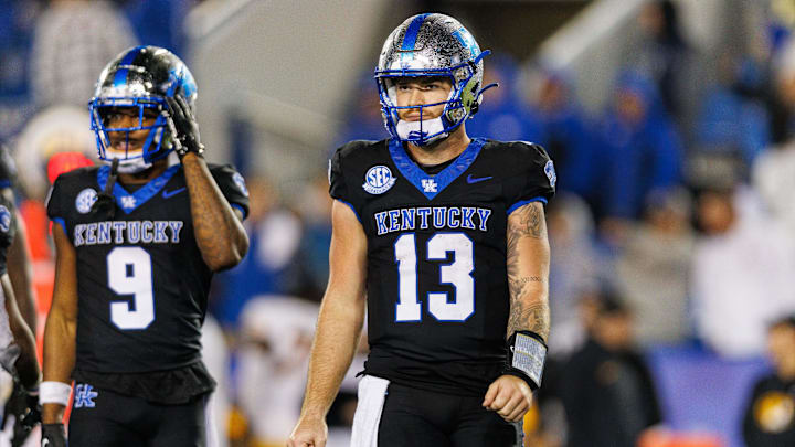 Oct 14, 2023; Lexington, Kentucky, USA; Kentucky Wildcats quarterback Devin Leary (13) looks to the sideline during the fourth quarter against the Missouri Tigers at Kroger Field. Mandatory Credit: Jordan Prather-Imagn Images