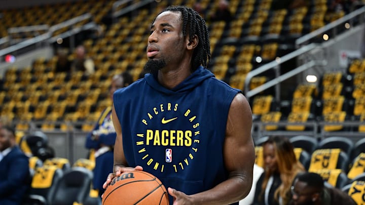 Oct 27, 2024; Indianapolis, Indiana, USA;  Indiana Pacers forward Aaron Nesmith (23) warms up before the game against the Philadelphia 76ers at Gainbridge Fieldhouse. Mandatory Credit: Marc Lebryk-Imagn Images
