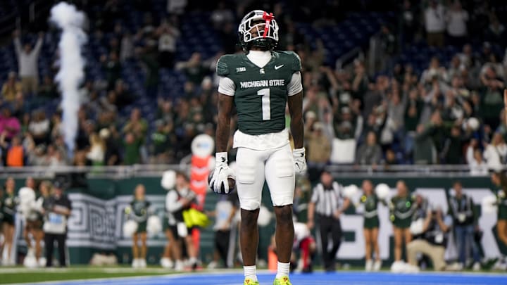Nov 29, 2025; Detroit, Michigan, USA; Michigan State wide receiver Omari Kelly (1) celebrates a touchdown against Maryland in the fourth quarter at Ford Field. Mandatory Credit: Brendan Mullin-Imagn Images
