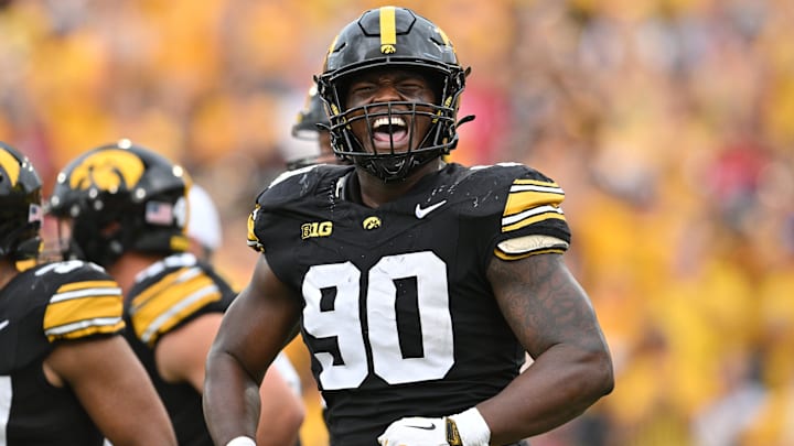Sep 14, 2024; Iowa City, Iowa, USA; Iowa Hawkeyes defensive end Brian Allen (90) reacts during the third quarter against the Troy Trojans at Kinnick Stadium. Mandatory Credit: Jeffrey Becker-Imagn Images