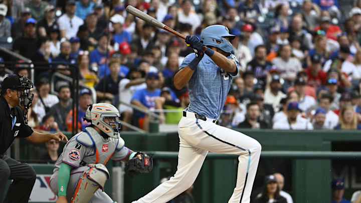 Apr 26, 2025; Washington, District of Columbia, USA; Washington Nationals outfielder James Wood (29) singles against the New York Mets during the first inning at Nationals Park. Apr 26, 2025; Washington, District of Columbia, USA; Washington Nationals outfielder James Wood (29) singles against the New York Mets during the first inning at Nationals Park.