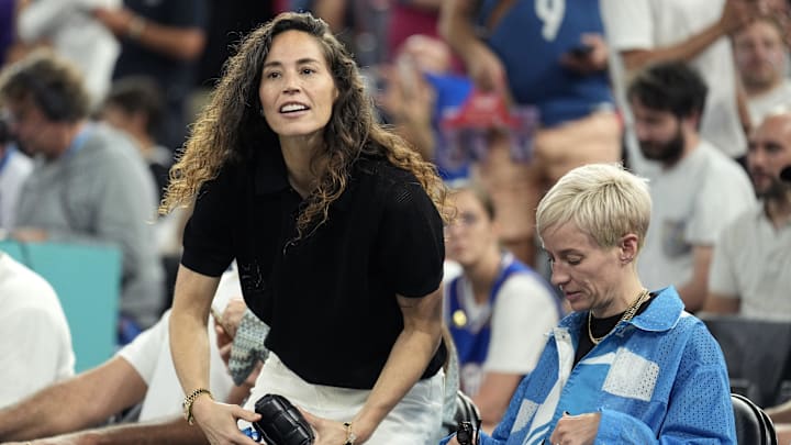 Aug 8, 2024; Paris, France; Sue Bird and Megan Rapinoe look on before the game between France and Germany in a men's basketball semifinal game during the Paris 2024 Olympic Summer Games at Accor Arena. Mandatory Credit: Kyle Terada-Imagn Images