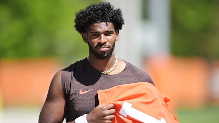 May 9, 2025; Berea, OH, USA; Cleveland Browns quarterback Shedeur Sanders (12) walks off the field after rookie minicamp at CrossCountry Mortgage Campus. Mandatory Credit: Ken Blaze-Imagn Images