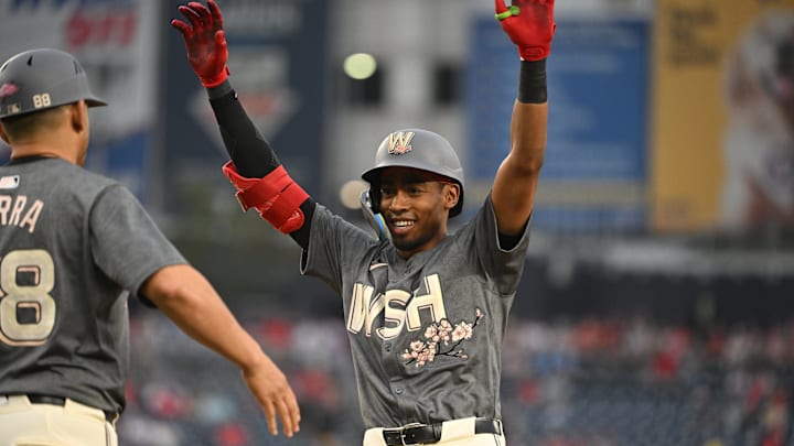 Sep 29, 2024; Washington, District of Columbia, USA; Washington Nationals second baseman Darren Baker (10) reacts after hitting a single against the Philadelphia Phillies during the ninth inning at Nationals Park. 