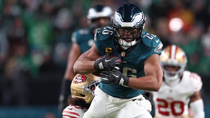 Jan 11, 2026; Philadelphia, PA, USA; San Francisco 49ers linebacker Eric Kendricks (43) tackles Philadelphia Eagles running back Saquon Barkley (26) during the second quarter in an NFC Wild Card Round game at Lincoln Financial Field. Mandatory Credit: Bill Streicher-Imagn Images
