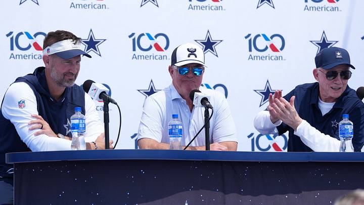 Dallas Cowboys coach Brian Schottenheimer (left), executive vice president Stephen Jones (center) and owner Jerry Jones at training camp opening press conference at River Ridge Playing Fields. Mandatory Credit: Kirby Lee-Imagn Images