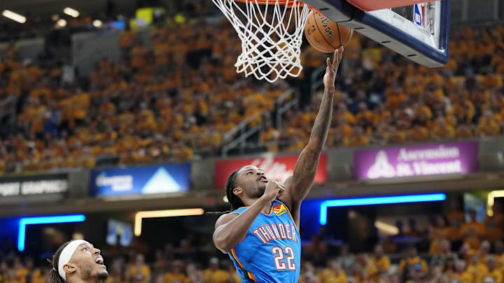 Jun 13, 2025; Indianapolis, Indiana, USA; Oklahoma City Thunder guard Cason Wallace (22) shoots the ball against Indiana Pacers center Myles Turner (33) during the first half during game four of the 2025 NBA Finals at Gainbridge Fieldhouse. Mandatory Credit: Kyle Terada-Imagn Images