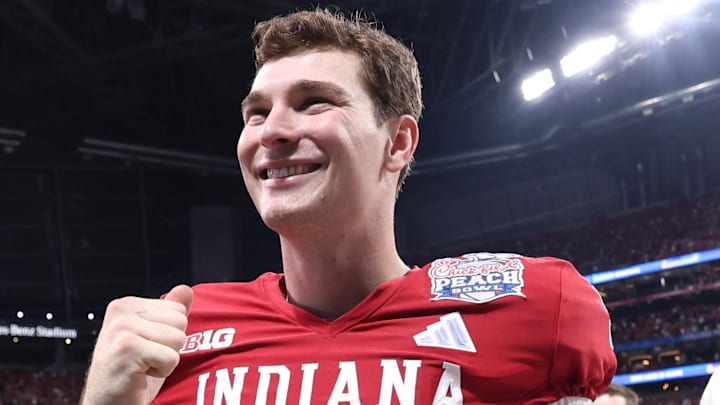 Jan 9, 2026; Atlanta, GA, USA; Indiana Hoosiers quarterback Fernando Mendoza (15) reacts after the 2025 Peach Bowl and semifinal game of the College Football Playoff at Mercedes-Benz Stadium. Mandatory Credit: Brett Davis-Imagn Images