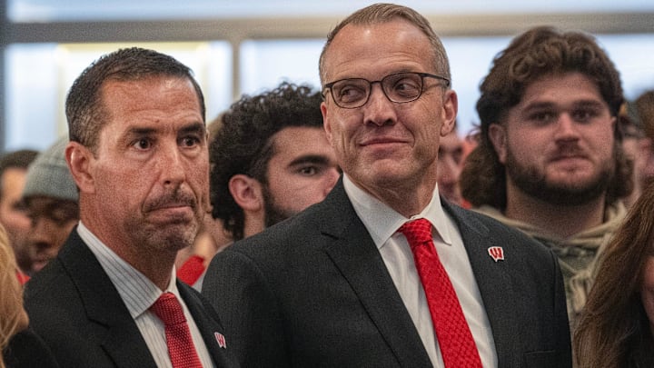 Luke Fickell, left is shown with athletic director Chris McIntosh at a welcome event November 28, 2022 at Camp Randall Stadium in Madison. He was previously head coach for six seasons at Cincinnati.
