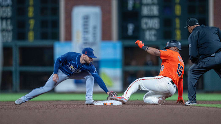 Aug 15, 2025; San Francisco, California; San Francisco Giants first baseman Rafael Devers (16) slides in safe after hitting a double against the Tampa Bay Rays during the ninth inning at Oracle Park. 