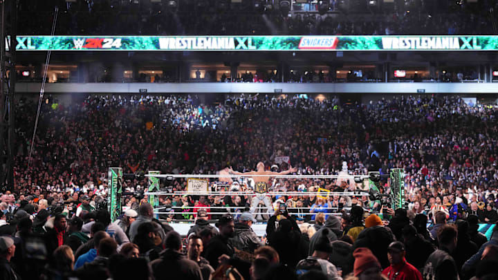 WWE Universal Championship match between Roman Reigns and Cody Rhodes during Wrestlemania XL.