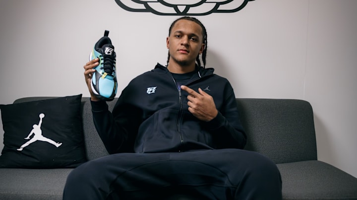 Paolo Banchero poses with his Player Edition Heir Series Jordan sneaker.