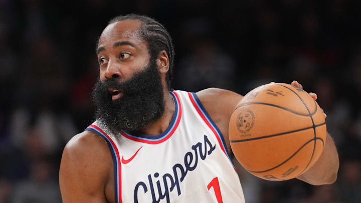 Mar 4, 2025; Phoenix, Arizona, USA; LA Clippers guard James Harden (1) dribbles against the Phoenix Suns during the first half at PHX Center.