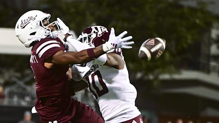 Oct 19, 2024; Starkville, Mississippi, USA;  Texas A&M Aggies defensive back Dezz Ricks (10) breaks up a pass intended for Mississippi State Bulldogs wide receiver Kelly Akharaiyi (1) during the fourth quarter at Davis Wade Stadium at Scott Field. Mandatory Credit: Matt Bush-Imagn Images