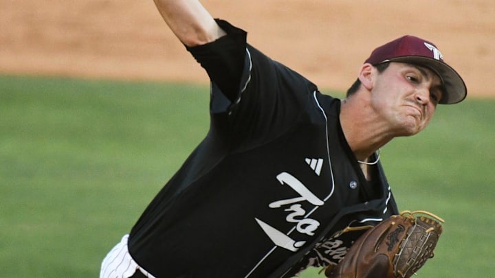Troy University relief pitcher Zach Fruit delivers a pitch against Boston College at Sewell-Thomas Stadium in Tuscaloosa. Troy University relief pitcher Zach Fruit delivers a pitch against Boston College at Sewell-Thomas Stadium in Tuscaloosa.