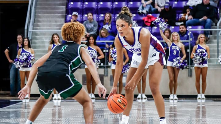 TCU Horned Frogs guard Donovyn Hunter (4) dribbles in the team's 89-49 win over the Jacksonville Dolphins on Dec. 14, 2025 at Schollmaier Arena in Fort Worth, Texas. 