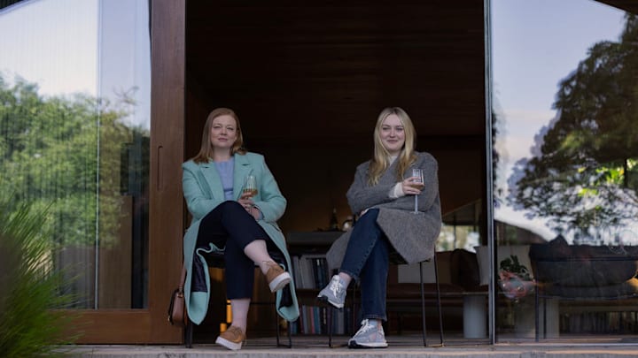 ALL HER FAULT -- Episode 108 -- Pictured: (l-r) Sarah Snook as Marissa Irvine, Dakota Fanning as Jenny Kaminski -- (Photo by: Sarah Enticknap/PEACOCK) ALL HER FAULT -- Episode 108 -- Pictured: (l-r) Sarah Snook as Marissa Irvine, Dakota Fanning as Jenny Kaminski -- (Photo by: Sarah Enticknap/PEACOCK)