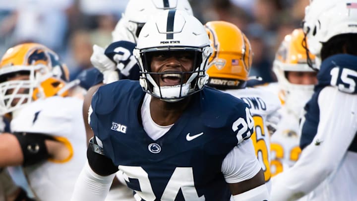 Penn State linebacker Ta'Mere Robinson (24) celebrates after recording a tackle for loss in the second half of an NCAA football game against Kent State, Saturday, Sept. 21, 2024, in State College, Pa.