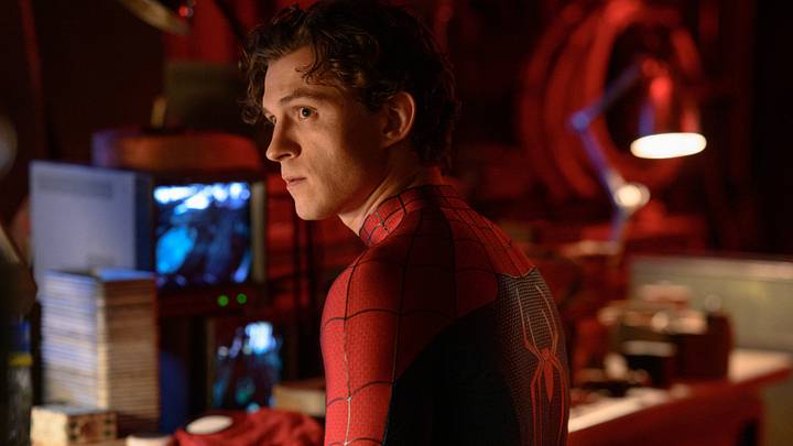 Peter Parker/Spider-Man (Tom Holland) works at his desk in Columbia Pictures SPIDER-MAN™: BRAND NEW DAY