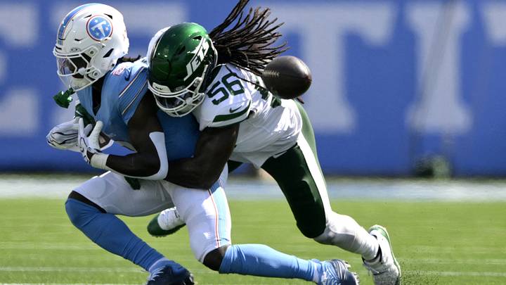 Sep 13, 2026; Nashville, Tennessee, USA; New York Jets linebacker Demario Davis (56) breaks up a pass intended for Tennessee Titans running back Tyjae Spears (2) during the third quarter at Nissan Stadium. Mandatory Credit: Steve Roberts-Imagn Images Sep 13, 2026; Nashville, Tennessee, USA; New York Jets linebacker Demario Davis (56) breaks up a pass intended for Tennessee Titans running back Tyjae Spears (2) during the third quarter at Nissan Stadium. Mandatory Credit: Steve Roberts-Imagn Images