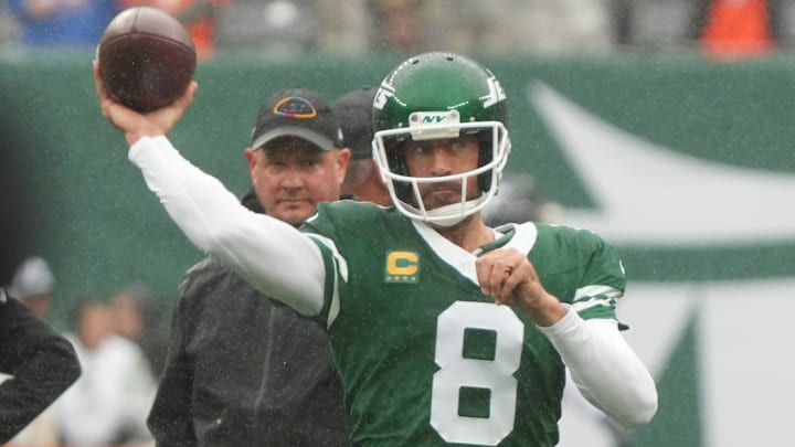 New York Jets offensive coordinator Nathaniel Hackett and quarterback Aaron Rodgers during pregame warm ups before a Week 4 game at MetLife Stadium.