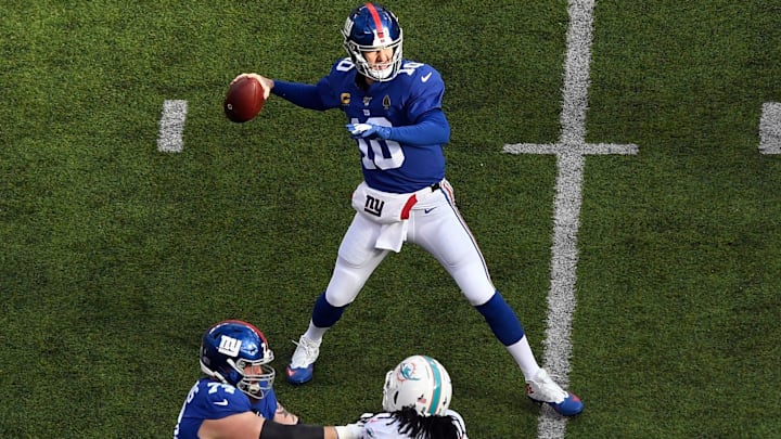 New York Giants quarterback Eli Manning (10) throws against the Miami Dolphins in the first half of an NFL game on Sunday, Dec. 15, 2019, in East Rutherford. New York Giants quarterback Eli Manning (10) throws against the Miami Dolphins in the first half of an NFL game on Sunday, Dec. 15, 2019, in East Rutherford.