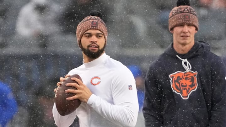 Jan 18, 2026; Chicago, IL, USA; Chicago Bears quarterback Caleb Williams (18) warms up while quarterback Tyson Bagent (17) looks on before an NFC Divisional Round game against the Los Angeles Rams at Soldier Field. Mandatory Credit: David Banks-Imagn Images