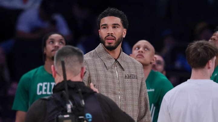 Oct 24, 2025; New York, New York, USA;  Boston Celtics guard Jayson Tatum, center, looks on during the fourth quarter against the New York Knicks at Madison Square Garden. Mandatory Credit: Vincent Carchietta-Imagn Images