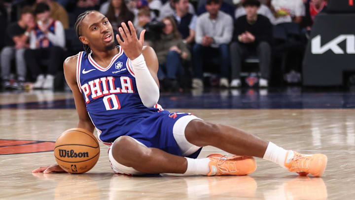 Jan 3, 2026; New York, New York, USA;  Philadelphia 76ers guard Tyrese Maxey (0) reacts after getting knocked down in the third quarter against the New York Knicks at Madison Square Garden. Mandatory Credit: Wendell Cruz-Imagn Images