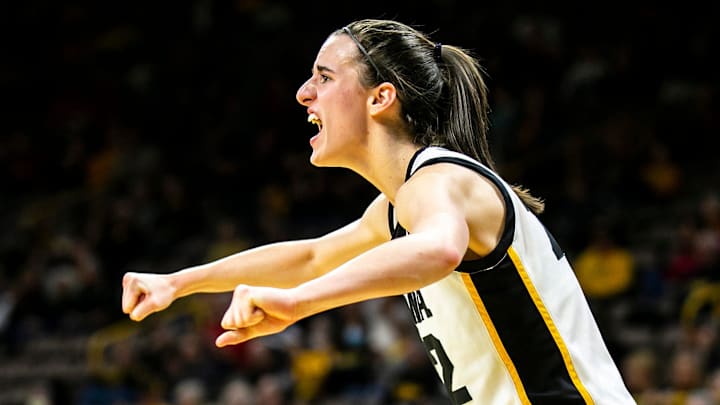 Iowa guard Caitlin Clark cheers on teammates during a NCAA Big Ten Conference women's basketball game against Northwestern, Wednesday, Jan. 11, 2023, at Carver-Hawkeye Arena in Iowa City, Iowa. Iowa guard Caitlin Clark cheers on teammates during a NCAA Big Ten Conference women's basketball game against Northwestern, Wednesday, Jan. 11, 2023, at Carver-Hawkeye Arena in Iowa City, Iowa.