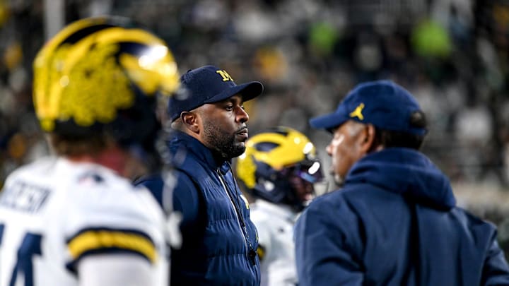 Michigan's head coach Sherrone Moore looks on before the game against Michigan State on Saturday, Oct. 25, 2025, at Spartan Stadium in East Lansing. Michigan's head coach Sherrone Moore looks on before the game against Michigan State on Saturday, Oct. 25, 2025, at Spartan Stadium in East Lansing.