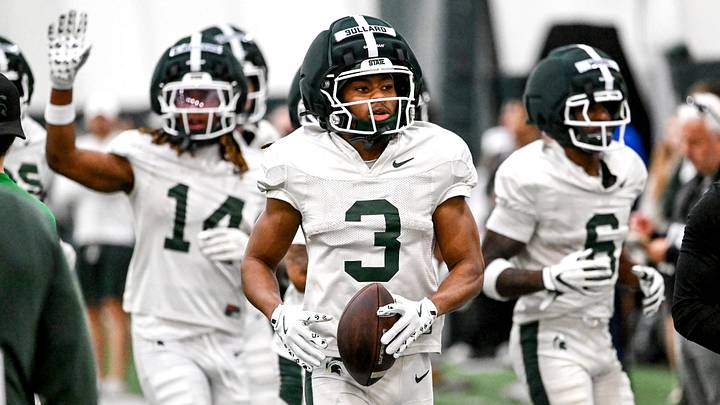 Michigan State's Rodney Bullard Jr. carries the ball while moving to the next drill during spring football practice on Tuesday, April 14, 2026, in East Lansing. Michigan State's Rodney Bullard Jr. carries the ball while moving to the next drill during spring football practice on Tuesday, April 14, 2026, in East Lansing.
