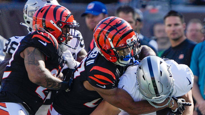 Cincinnati Bengals cornerback DJ Turner II (20) stops Las Vegas Raiders tight end Brock Bowers (89) in the 1st quarter at Paycor Stadium Sunday, November 3, 2024.