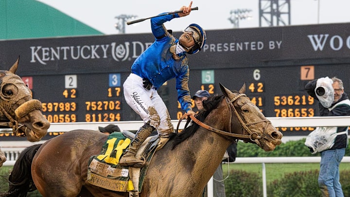 Junior Alvarado celebrates after riding Sovereignty to victory in the 151st Kentucky Derby at Churchill Downs in Louisville, Kentucky on May 3, 2025 