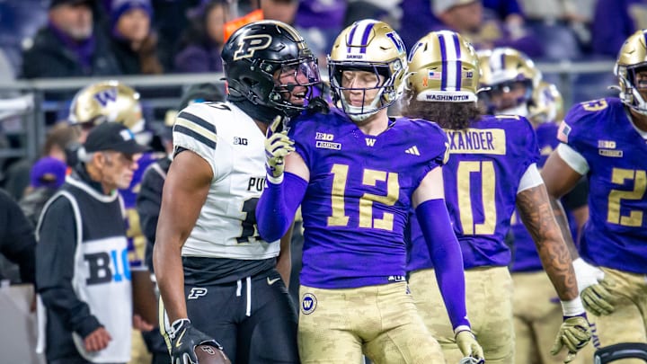 Alex McLaughlin (12) gets an earful from a Purdue player. 