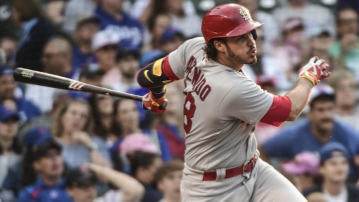 Jun 5, 2022; Chicago, Illinois, USA; St. Louis Cardinals third baseman Nolan Arenado (28) hits a single to drive in two runs in the fifth inning against the Chicago Cubs at Wrigley Field. Mandatory Credit: Benny Sieu-Imagn Images Jun 5, 2022; Chicago, Illinois, USA; St. Louis Cardinals third baseman Nolan Arenado (28) hits a single to drive in two runs in the fifth inning against the Chicago Cubs at Wrigley Field. Mandatory Credit: Benny Sieu-Imagn Images