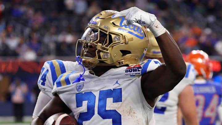 Dec 16, 2023; Inglewood, CA, USA; UCLA Bruins running back TJ Harden (25) reacts after scoring a touchdown against Boise State Broncos during the third quarter of the LA Bowl at SoFi Stadium. Mandatory Credit: Kiyoshi Mio-Imagn Images Dec 16, 2023; Inglewood, CA, USA; UCLA Bruins running back TJ Harden (25) reacts after scoring a touchdown against Boise State Broncos during the third quarter of the LA Bowl at SoFi Stadium. Mandatory Credit: Kiyoshi Mio-Imagn Images