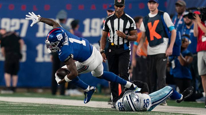 New York Giants wide receiver Malik Nabers (1) catches a pass before being tackled by Dallas Cowboys cornerback Daron Bland (26) during a week one opening game between the New York Giants and Dallas Cowboys at Metlife Stadium on Sunday, Sept. 13, 2026, in East Rutherford, NJ. New York Giants wide receiver Malik Nabers (1) catches a pass before being tackled by Dallas Cowboys cornerback Daron Bland (26) during a week one opening game between the New York Giants and Dallas Cowboys at Metlife Stadium on Sunday, Sept. 13, 2026, in East Rutherford, NJ.