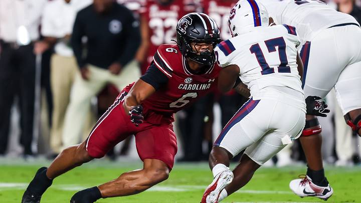 Sep 6, 2025; Columbia, South Carolina, USA; South Carolina Gamecocks linebacker Dylan Stewart (6) brings down South Carolina State Bulldogs running back KZ Adams (17) in the first quarter at Williams-Brice Stadium. Mandatory Credit: Jeff Blake-Imagn Images Sep 6, 2025; Columbia, South Carolina, USA; South Carolina Gamecocks linebacker Dylan Stewart (6) brings down South Carolina State Bulldogs running back KZ Adams (17) in the first quarter at Williams-Brice Stadium. Mandatory Credit: Jeff Blake-Imagn Images