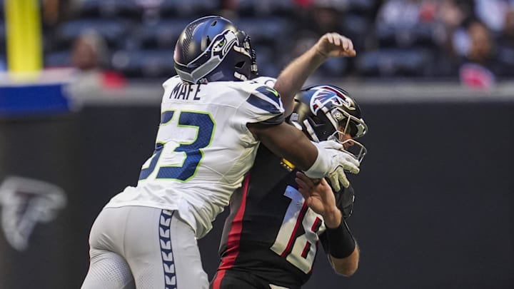 Seattle Seahawks linebacker Boye Mafe (53) hits Atlanta Falcons quarterback Kirk Cousins