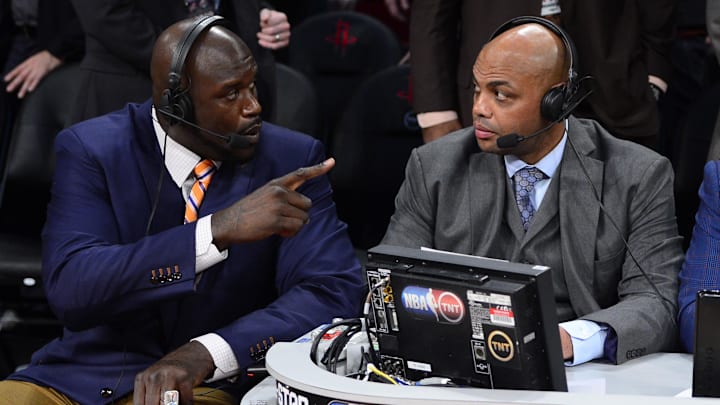 Feb 16, 2013; Houston, TX, USA; TNT broadcaster Shaquille O'Neal (left) and Charles Barkley talk during the 2013 NBA All-Star slam dunk contest at the Toyota Center. Mandatory Credit: Bob Donnan-Imagn Images