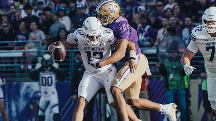 Isaiah Ward literally runs into Northwestern QB Jack Lausch for a sack.