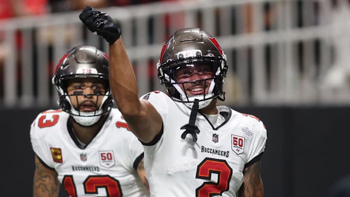 Sep 7, 2025; Atlanta, Georgia, USA; Tampa Bay Buccaneers wide receiver Emeka Egbuka (2) reacts after scoring a touchdown against the Atlanta Falcons during the second quarter at Mercedes-Benz Stadium. Mandatory Credit: Brett Davis-Imagn Images