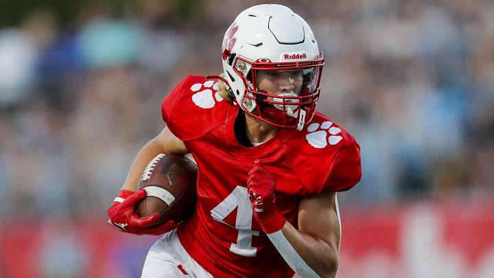 Beechwood wide receiver Tyler Fryman (4) runs with the ball against Covington Catholic in the first half at Beechwood High School Sept. 15, 2023.