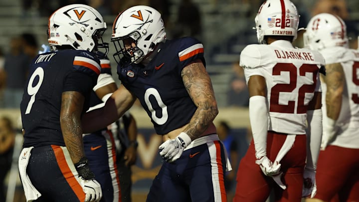 Sep 20, 2025; Charlottesville, Virginia, USA; Virginia Cavaliers tight end Sage Ennis (0) celebrates with Cavaliers tight end Dakota Twitty (9) after catching a touchdown pass against the Stanford Cardinal during the third quarter at Scott Stadium. Mandatory Credit: Geoff Burke-Imagn Images Sep 20, 2025; Charlottesville, Virginia, USA; Virginia Cavaliers tight end Sage Ennis (0) celebrates with Cavaliers tight end Dakota Twitty (9) after catching a touchdown pass against the Stanford Cardinal during the third quarter at Scott Stadium. Mandatory Credit: Geoff Burke-Imagn Images