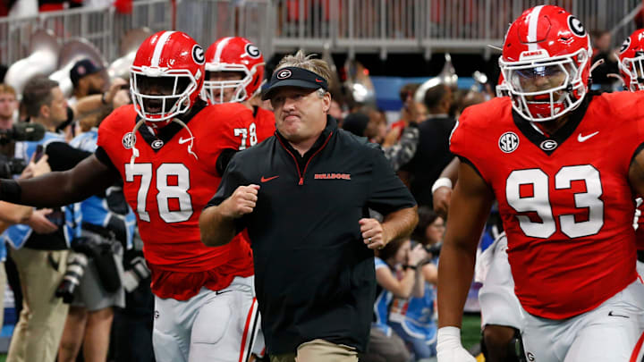 Georgia coach Kirby Smart leads his team onto the field before the start of the NCAA Aflac Kickoff Game in Atlanta, on Saturday, Aug. 31, 2024. Georgia coach Kirby Smart leads his team onto the field before the start of the NCAA Aflac Kickoff Game in Atlanta, on Saturday, Aug. 31, 2024.