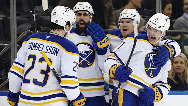 Buffalo Sabres players Mattias Samuelsson, Alex Tuch, Bowen Byram and Ryan McLeod