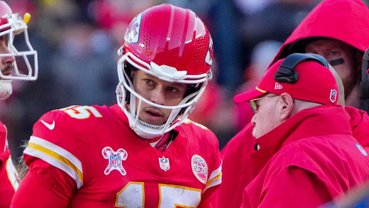 Dec 21, 2024; Kansas City, Missouri, USA; Kansas City Chiefs quarterback Patrick Mahomes (15) talks with head coach Andy Reid during the second half against the Houston Texans at GEHA Field at Arrowhead Stadium. Mandatory Credit: Denny Medley-Imagn Images