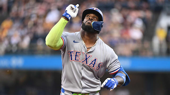 Jun 11, 2025; Pittsburgh, Pennsylvania, USA; Texas Rangers right fielder Adolis Garcia Celebrates after hitting a solo home run against the Pittsburgh Pirates during the fourth inning at PNC Park. 